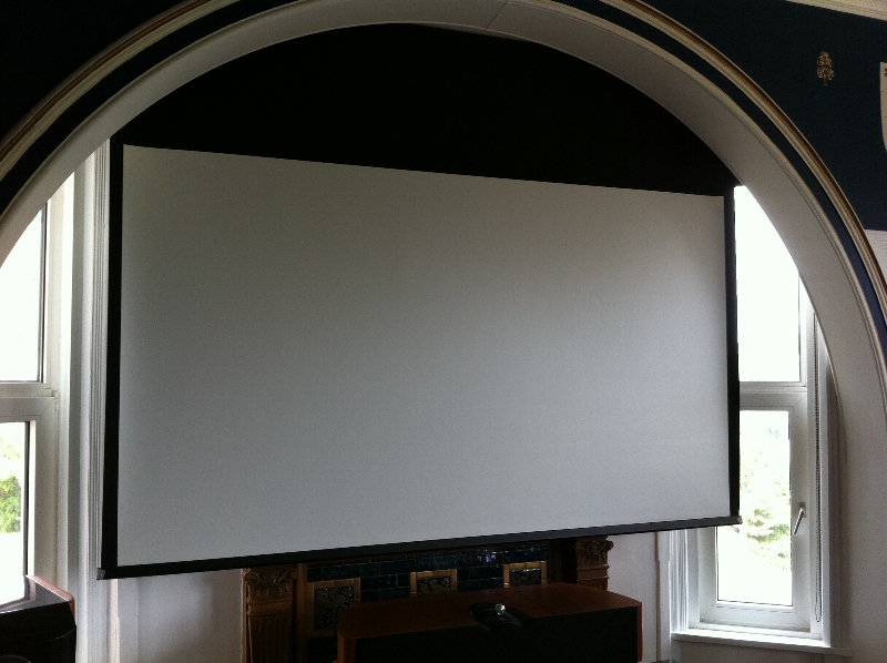 Large 103” screen tucked under arch